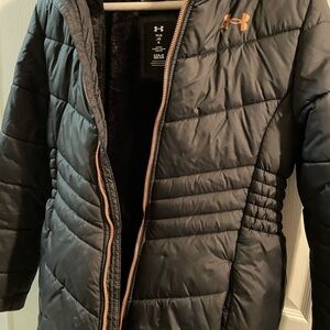 Under Armour Black Jacket with Orange Zipper small tear on back sleeve